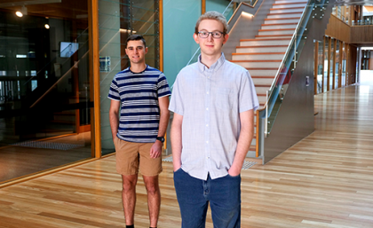 Warwick Solar Farm – Bright Futures Scholarship recipients: L-R, Benjamin Rogers, Benjamin Guy. Two men standing in front of a staircase
